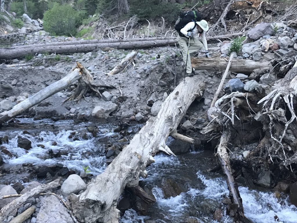 Tim crossing river