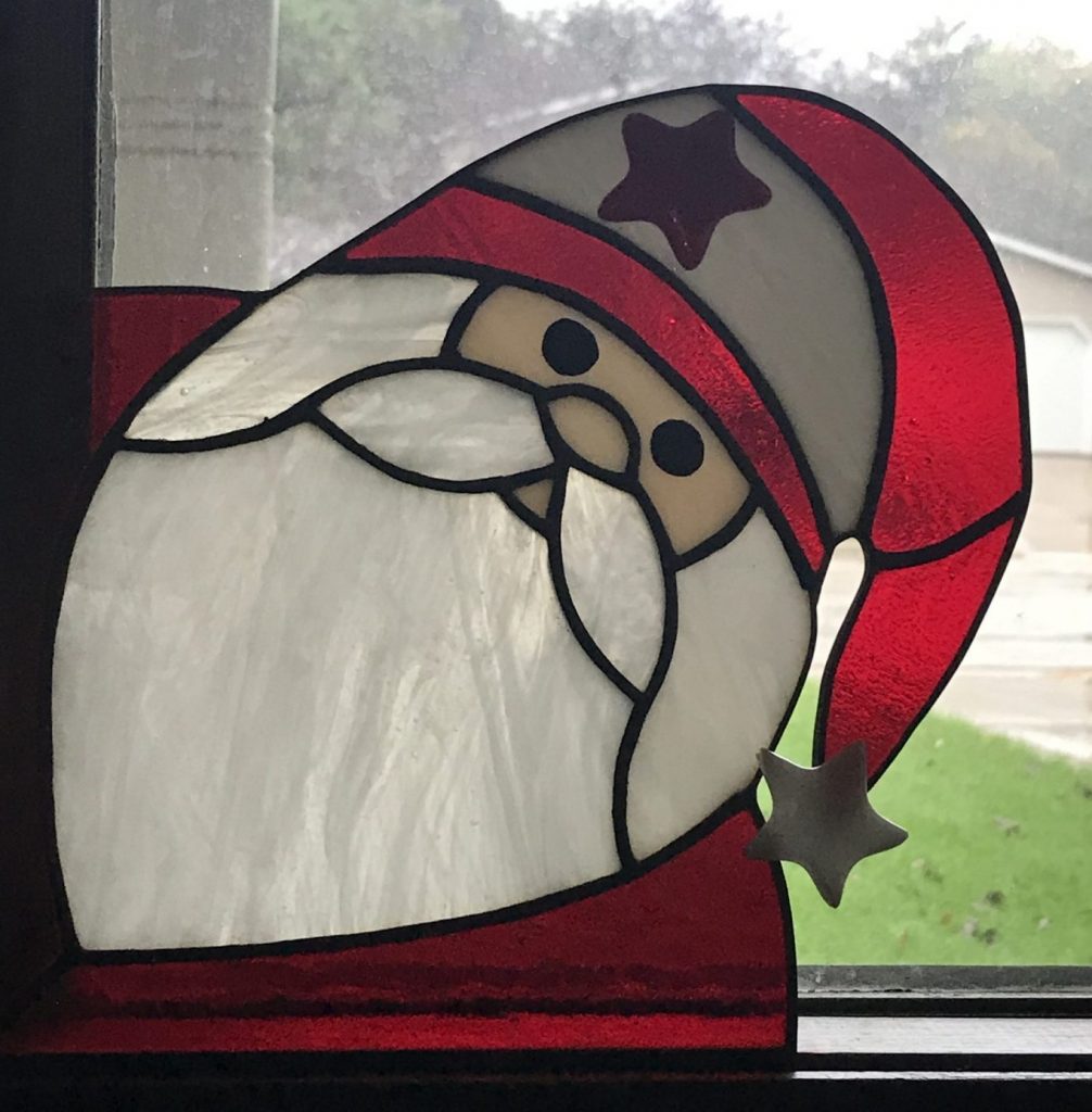 Santa peeking in window