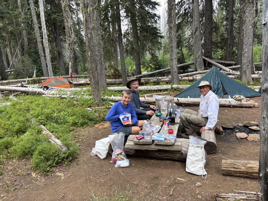 Three guys and tents