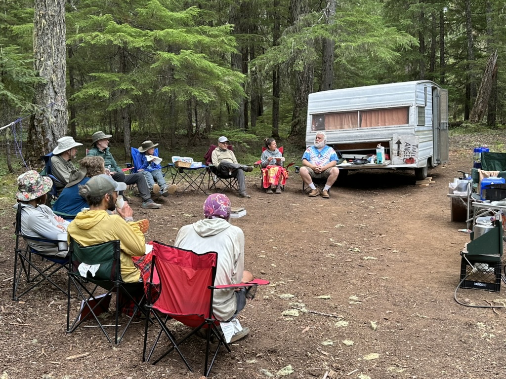 Hikers sitting in chairs